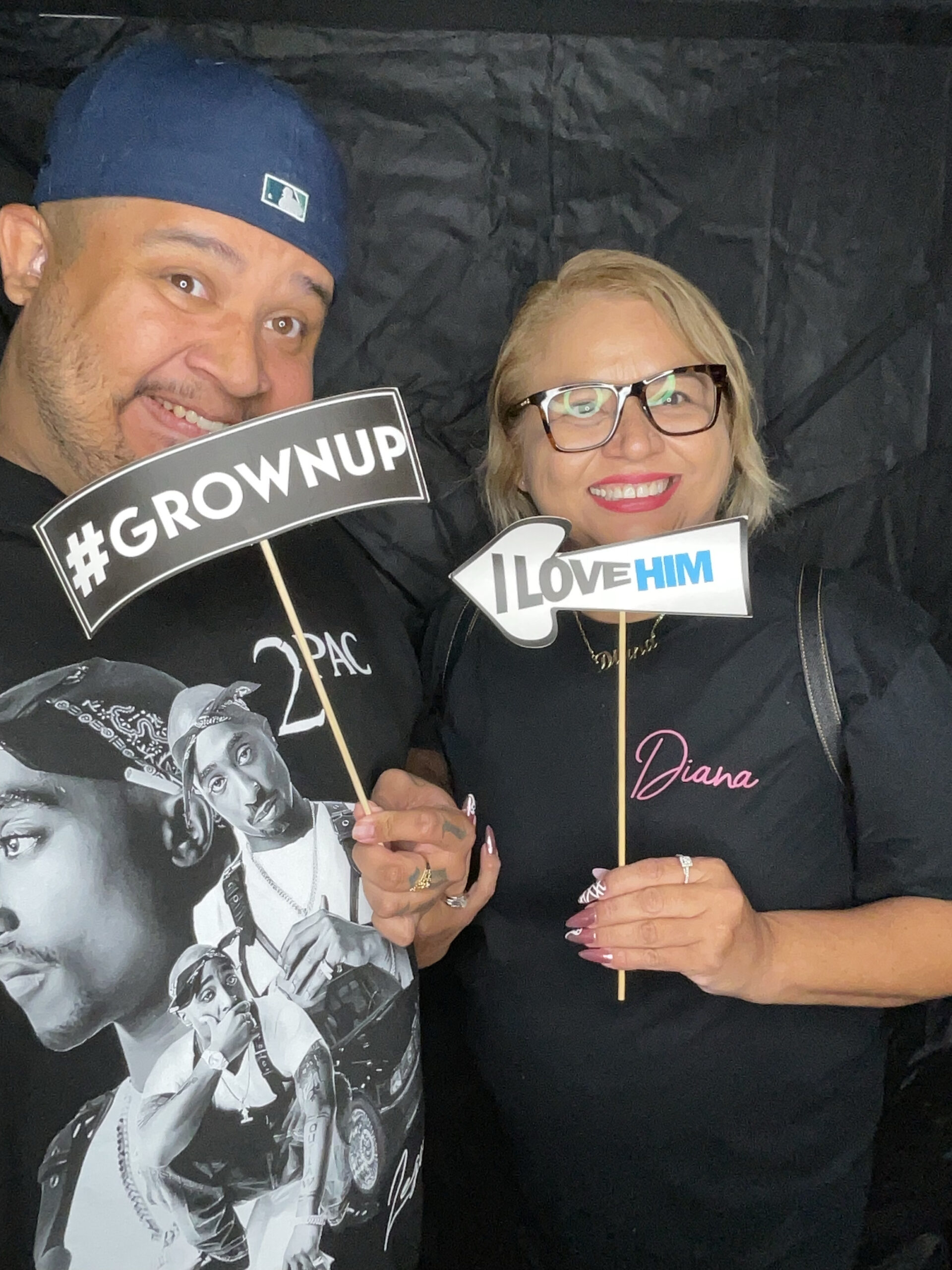 mom and son at photo booth